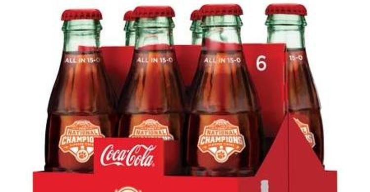 The bottles feature All-In 15-0 at the top.