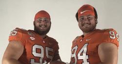 Clemson D-line twins put on scholarship