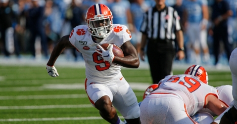 Etienne looks for running room in the first half. (USA TODAY Sports-Neil Redmond)