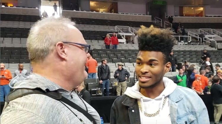 Magician Jibrizy Taylor performs magic tricks at CFP media day