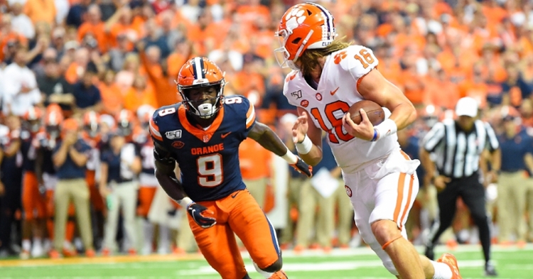 Trevor Lawrence looks back as he scores (Photo by Rich Barnes, USAT)