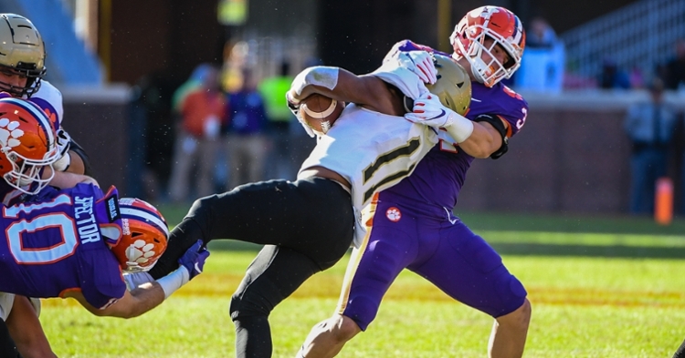Logan Rudolph takes a Wofford ballcarrier to the ground.