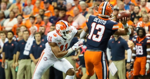 Simmons takes aim at Syracuse quarterback Tommy DeVito Saturday (Photo by Susan Lloyd)