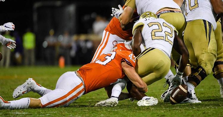 Chad Smith forces a fumble against the Yellow Jackets.