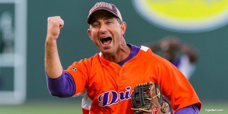 Swinney celebrates at Clemson's celebrity softball game on Monday night. (Photo: David Grooms)