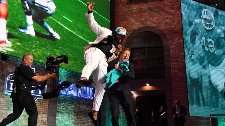 Christian Wilkins takes aim at Roger Goodell (Photo by Christopher Hanewinckel, USAT)