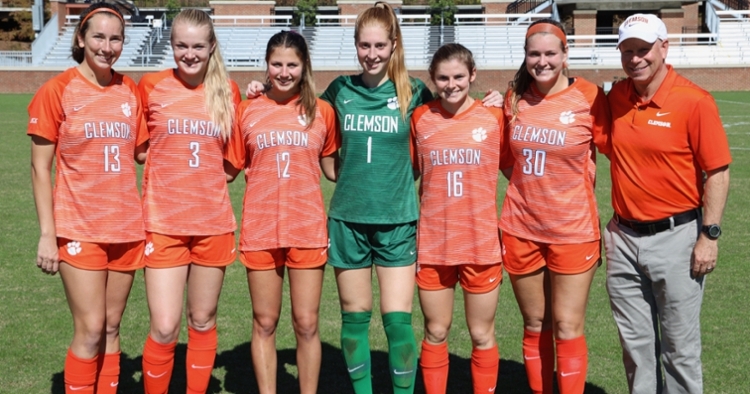 Seniors with Coach Eddie Radwanski (Photo credit: Allen Hodges)