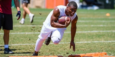 Keith Adams, Jr., works out at camp