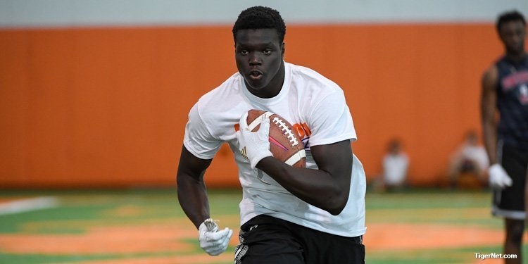 Ajou works out in the afternoon session of Dabo Swinney's camp in June