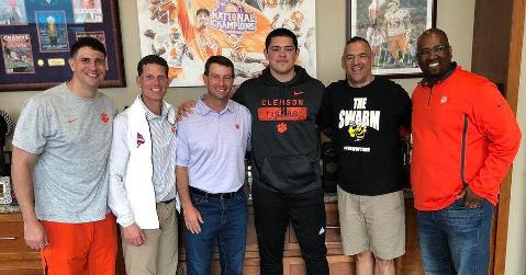 Rich Bresee (second from right) poses with his son Bryan and the Clemson coaches