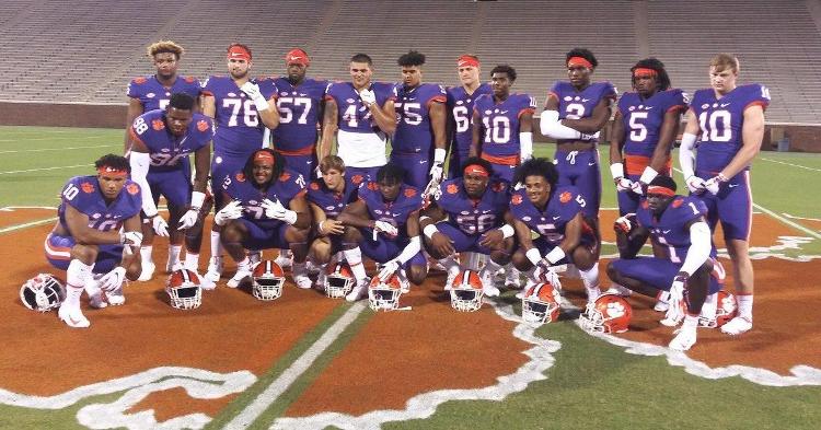 All In Cookout participants line up at midfield Friday night