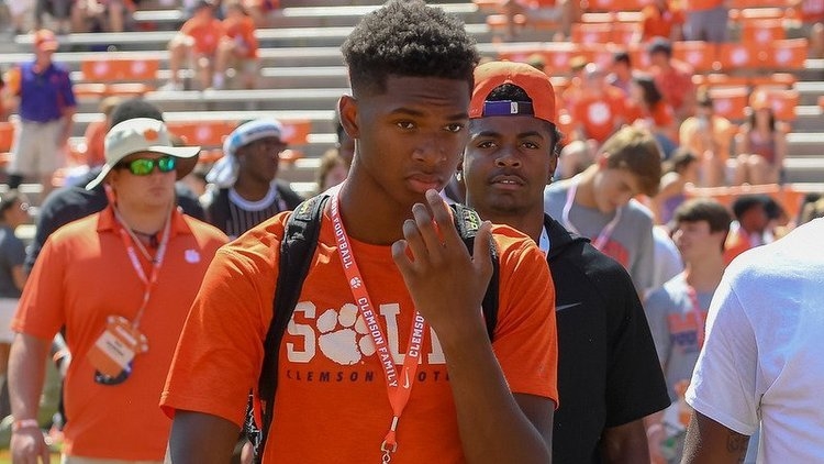 EJ Williams walks the sidelines on a visit last season
