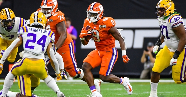Etienne looks for yards in the first half.