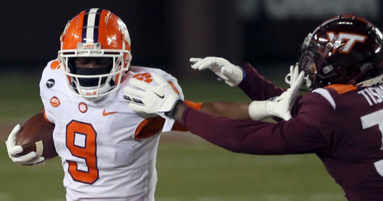 Travis Etienne carries the ball against Virginia Tech. (Photo courtesy ACC)