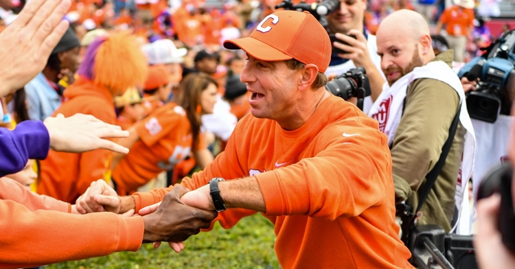 Swinney greets Clemson fans after the victory at South Carolina.