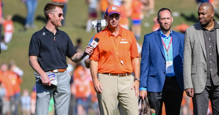 Swinney speaks with ESPN's Marty Smith during the spring game last year
