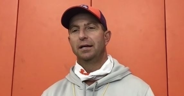 Swinney talks to the media Wednesday after practice
