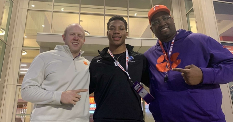 Dudley (center) poses with area recruiter Todd Bates (right).