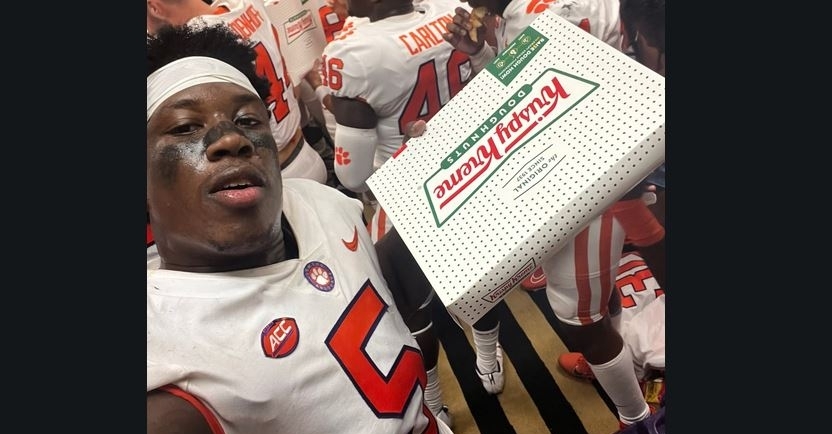 Clemson celebrates victory over Wake Forest by eating Krispy Kreme donuts